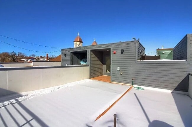 Building Photo - Modern LoHi Living with Rooftop Deck & City Views!!