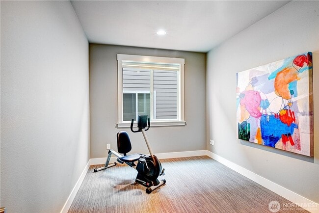 Building Photo - Luxury NW Living: 4 Bedroom Masterpiece with Dual Suites and Private Yard in Desirable Browns Point!