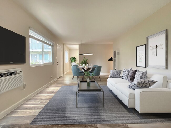 Living room and dining area at Pleasanton Heights Apartment Homes - Pleasanton Heights