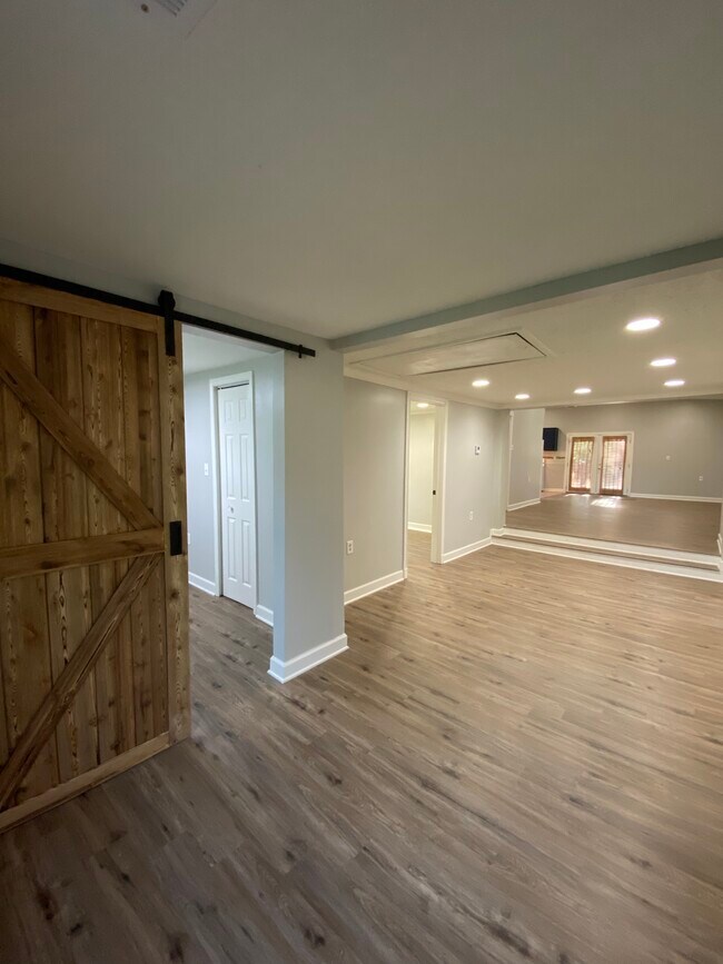 View as you enter the house with the 1st bedroom to the left - 1050 Janet Dr