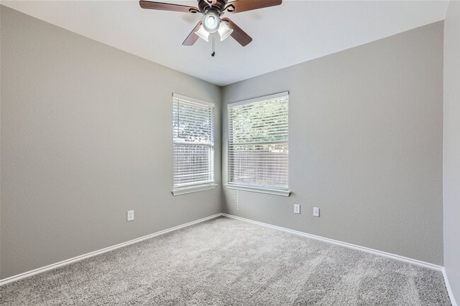 Building Photo - Charming 3/2/2 with Private Fenced Backyard!