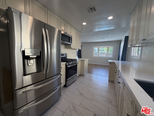 Building Photo - 6223 Enfield Ave