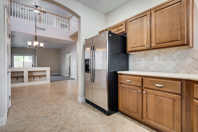 Building Photo - Spacious 3-Bedroom Home Featuring Downstai...