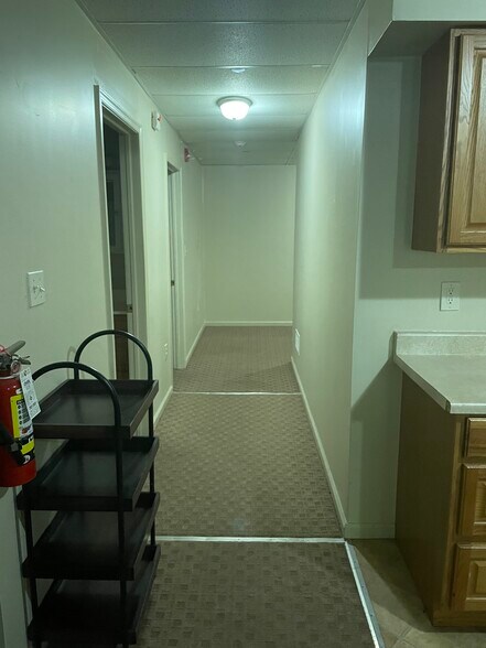 Hallway to kitchen - 105 W Main St