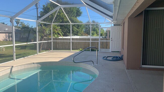 Building Photo - Dive Into Comfort – Home with Pool , Speci...