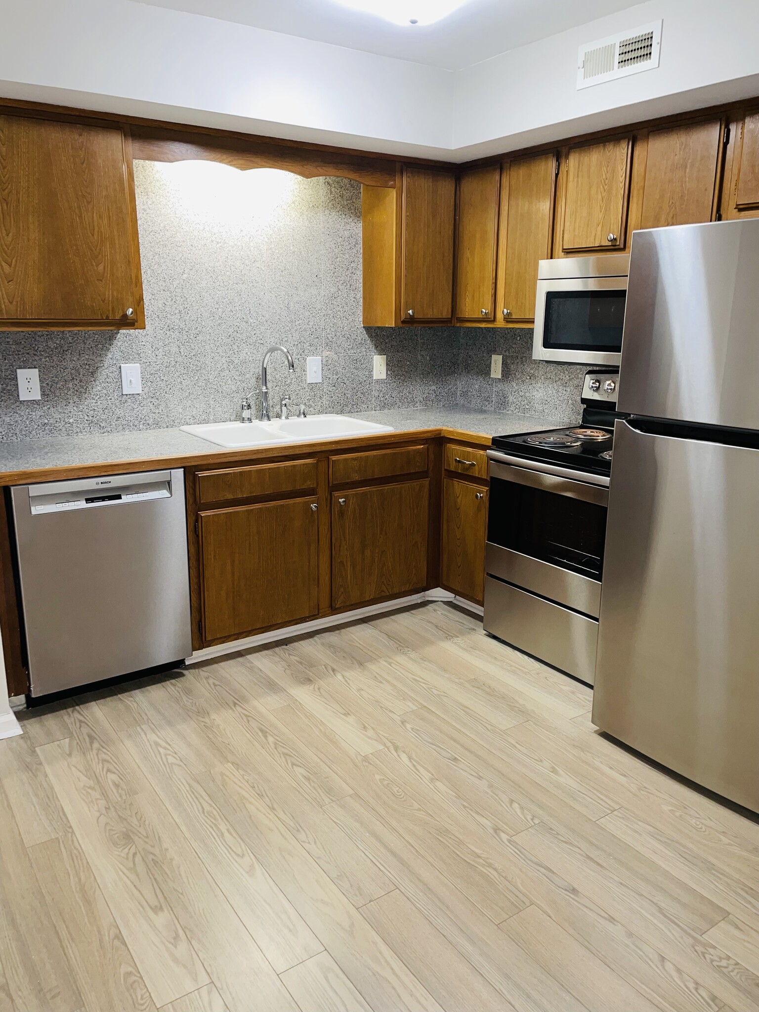 Kitchen- new floors/appliances - 196 Edgewood Drive