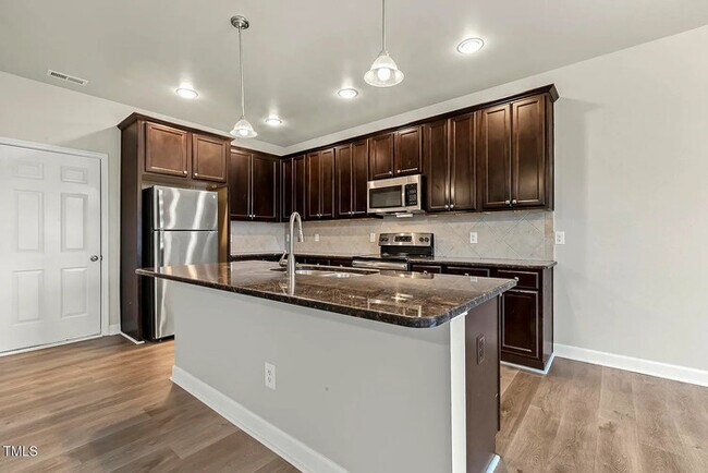 Building Photo - Earn Wealth While Leasing - Like a Homeown...