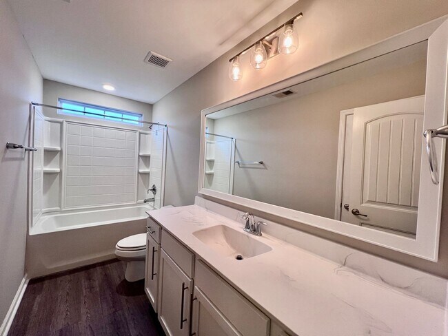 Building Photo - 3 bed/2.5 bath at end unit townhome in Berkeley Walk at Savannah Quarters with garage