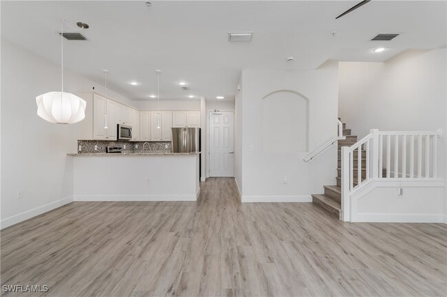 Building Photo - 9072 Covina Dr N