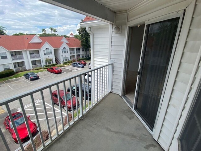Building Photo - Top Floor 1 Bedroom condo in the gated com...