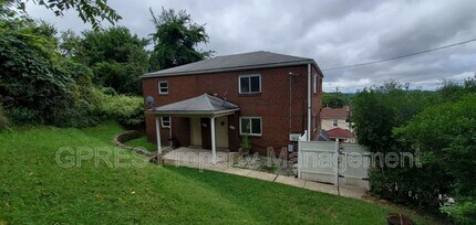 Building Photo - 5706-5708 Poketa Rd.