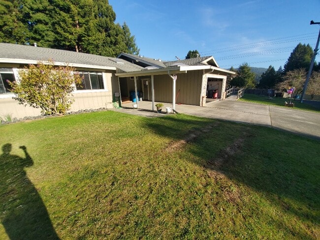 Building Photo - Spacious 1 bedroom with deck, wooded view & garden area. Most utilities included.