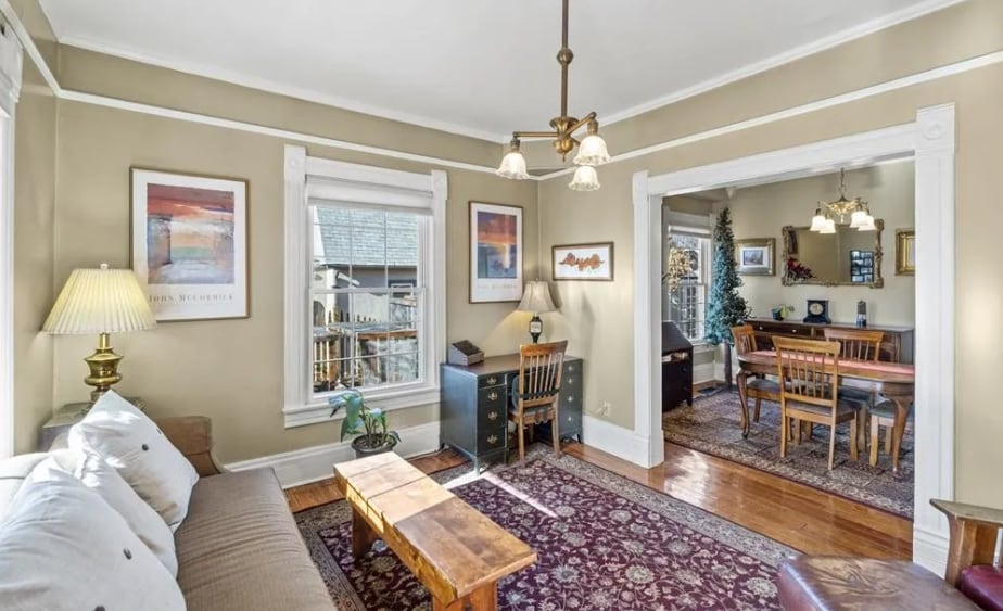 Furnished view of gorgeous features showing front living room and peak into dining room off kitchen - 812 E Cache La Poudre St