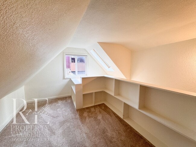 Building Photo - Private Retreat with Expansive Yard & Loft Space