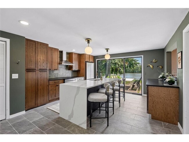 Building Photo - 5636 Twin Lake Terrace N