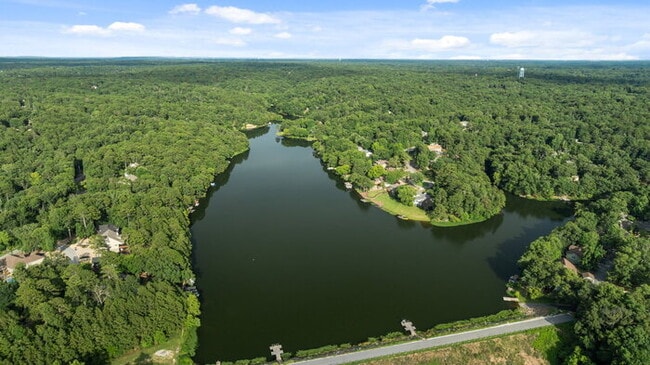 Building Photo - Serene Bella Vista Lakeside 4 bedroom