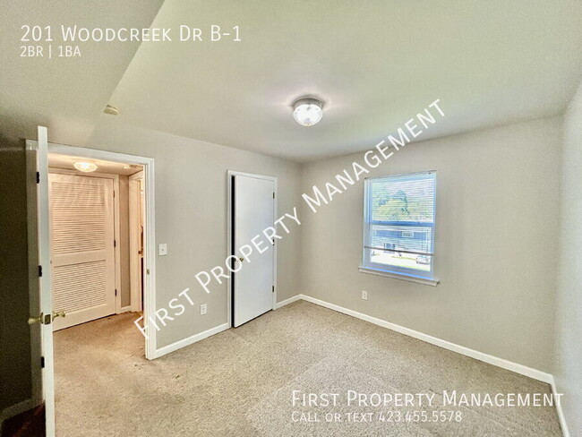 Building Photo - 201 Woodcreek Dr