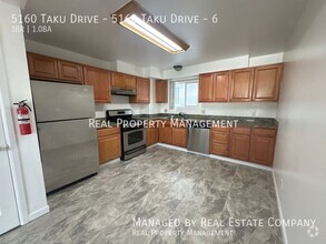 Building Photo - Three Bedroom One Bath Apartment Four Minu...