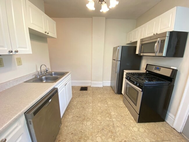 Building Photo - E 4th Ave 88-90 NCR