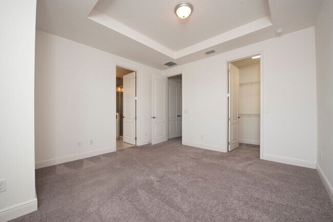 Building Photo - Two story Townhouse 2-bedroom, 2.5 bath in Eagle Creek of Lake Nona