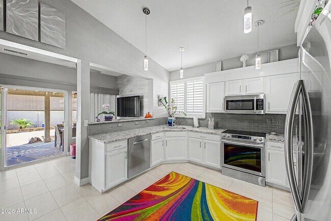 Building Photo - 9026 W Escuda Dr
