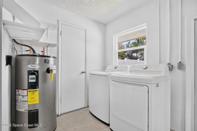 Building Photo - Welcome to this beautifully remodeled 4-bedroom, 3-bath home in the heart of Indialantic Beach!