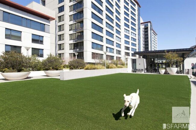 Building Photo - Spacious One-Bedroom Elegance in a Luxury Doorman Building with EV Parking