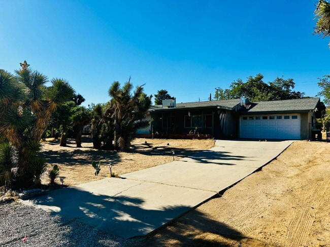 Building Photo - Spacious 2 bd, 2 ba with attached finished garage