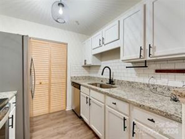 Kitchen View Looking at Dishwasher & Sink - 962 Plaza Walk Dr