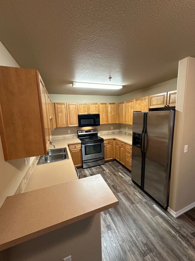 Building Photo - PROMENADE LOOP CONDO (RPM#154)