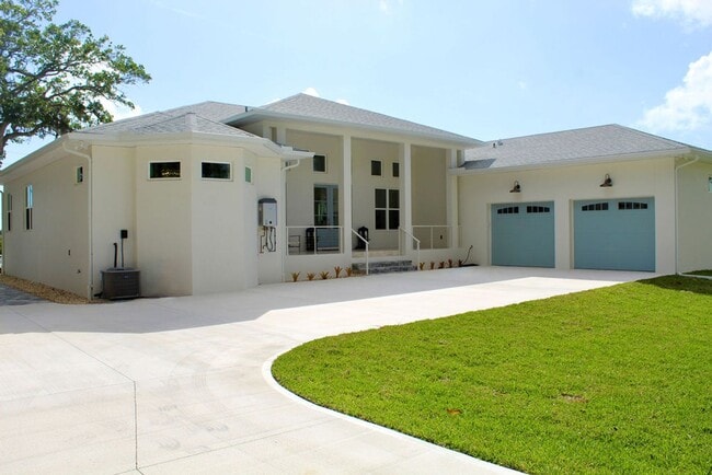 Building Photo - Fully Furnished 3 Bedroom, 3.5 Bath Home with Stunning Intracoastal views with dock