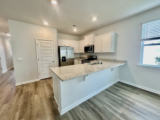 Building Photo - Four Bedroom Single Level Home in the Retreat at East Argent!