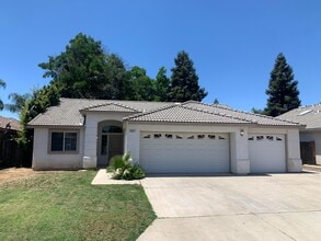 Building Photo - 8651 N Woodrow Ave