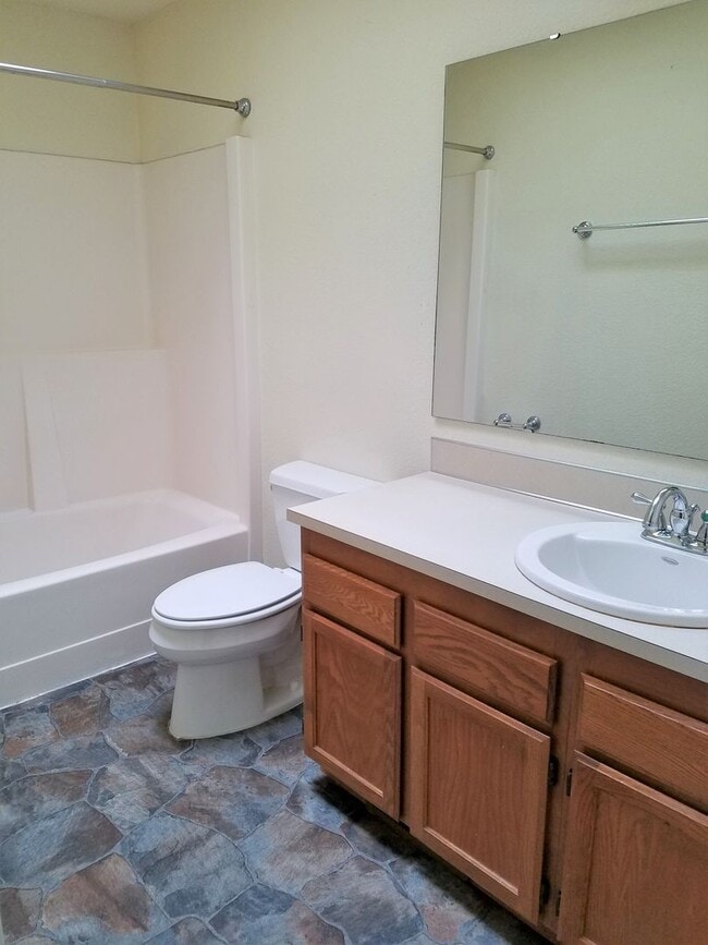 Building Photo - Spacious 4-Bedroom Home with Fenced Yard &...