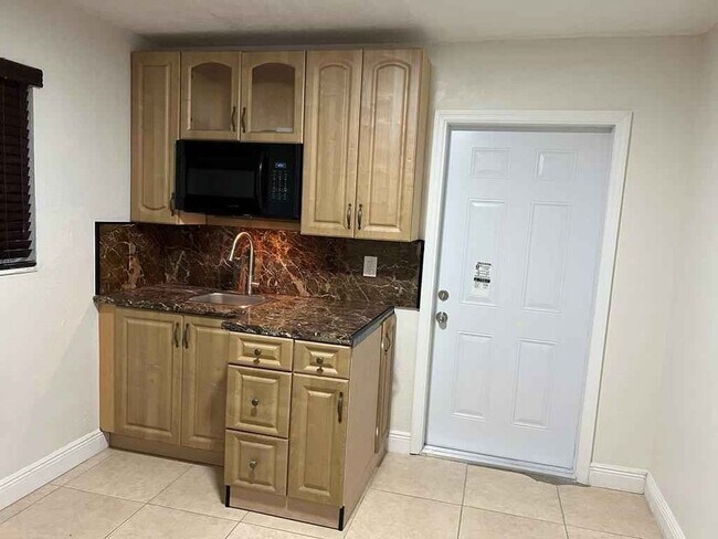 Building Photo - 6870 SW 5th Ct