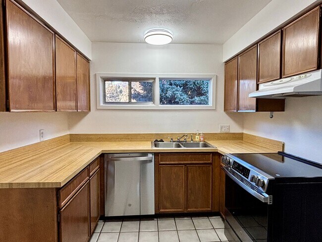 Building Photo - Updated 3BR Evergreen Home w/ Garage & Fenced Yard