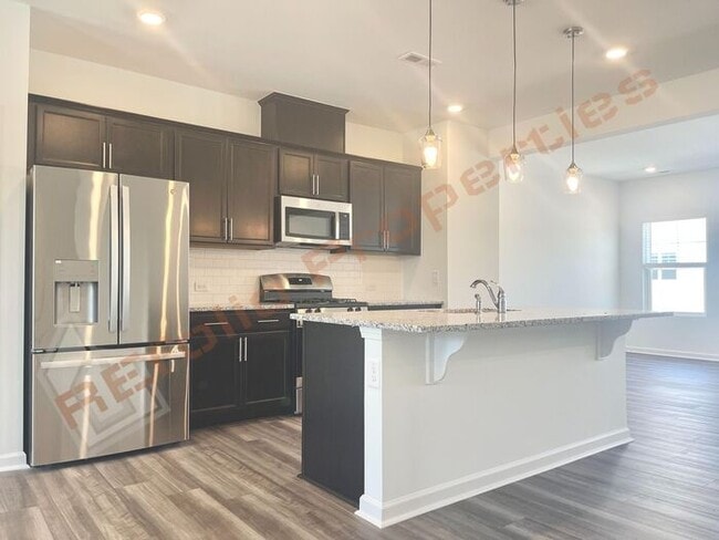 Building Photo - Brand New 3 Story 4 bedroom, 3.5 bathroom ...