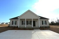 Building Photo - NEW 2 Bedroom Cottage Available TODAY!