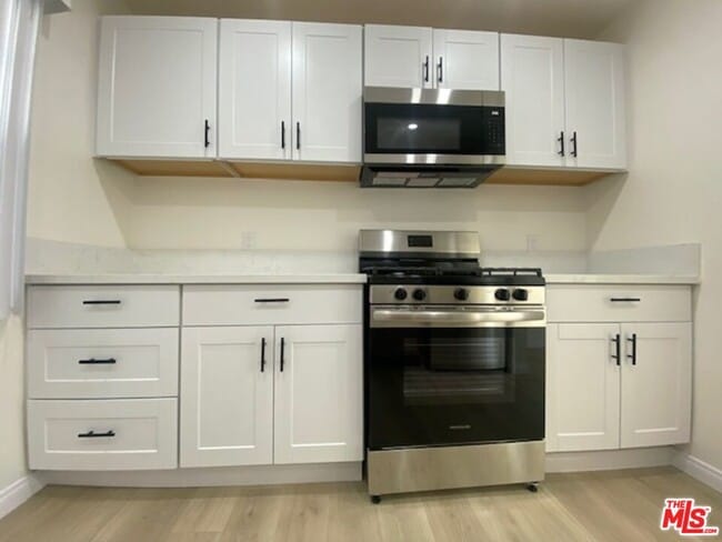 Building Photo - 1600 N Martel Ave