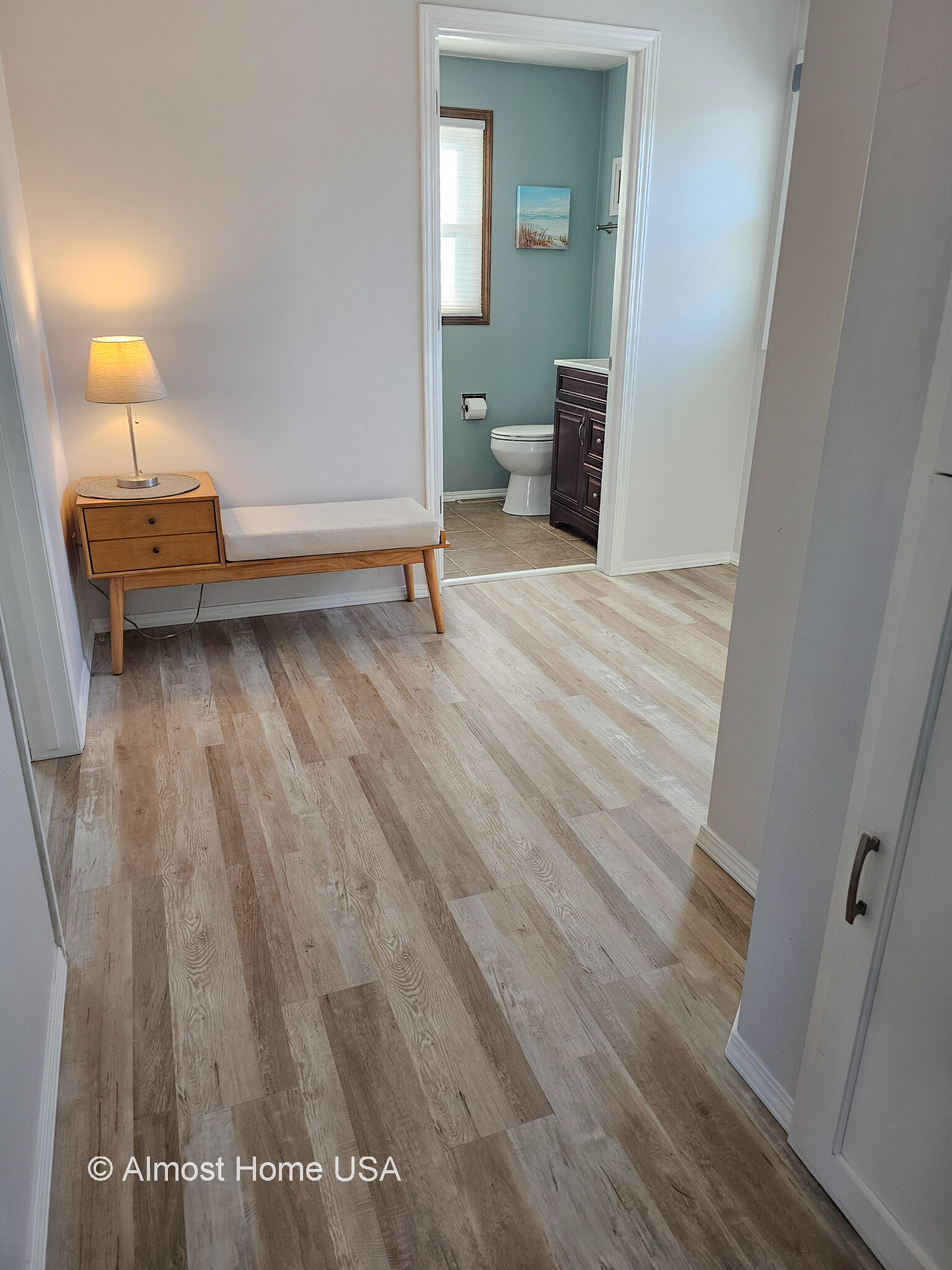 New plank flooring. - 1028 Coppens Rd