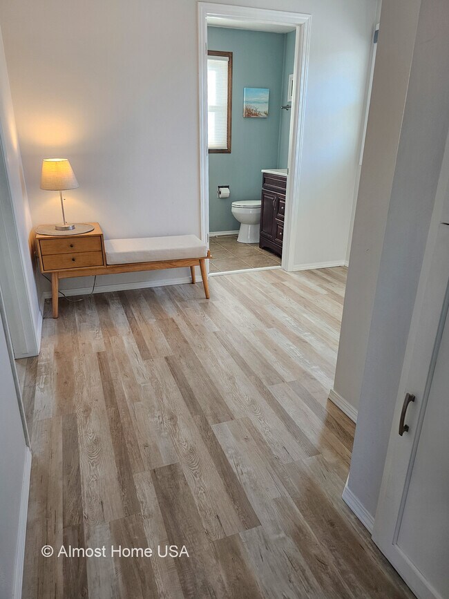 New plank flooring. - 1028 Coppens Rd