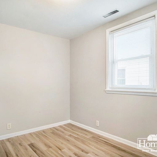 Building Photo - Charming two-bedroom, one-bath home offering a comfortable layout with ample natural light