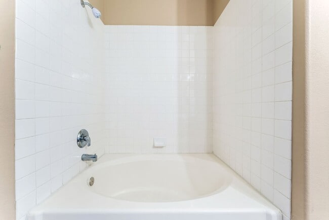 Building Photo - Bright & Stylish Condo with Fireplace and Private Balcony in a Resort-Style Community!