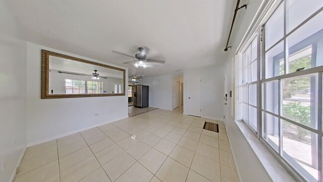 Building Photo - Charming 3-Bedroom Home with Sunroom and S...