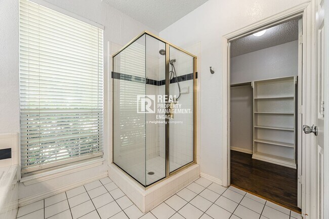 Building Photo - Recently Updated Plano Property with Modern Features and Serene Surroundings