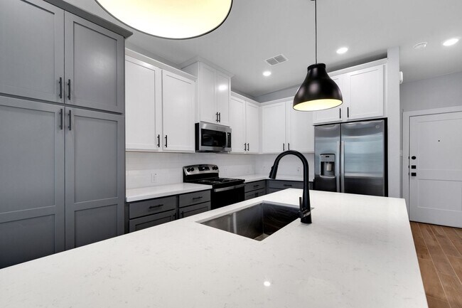 Building Photo - JUNE SPECIAL! - Beautiful Townhome!