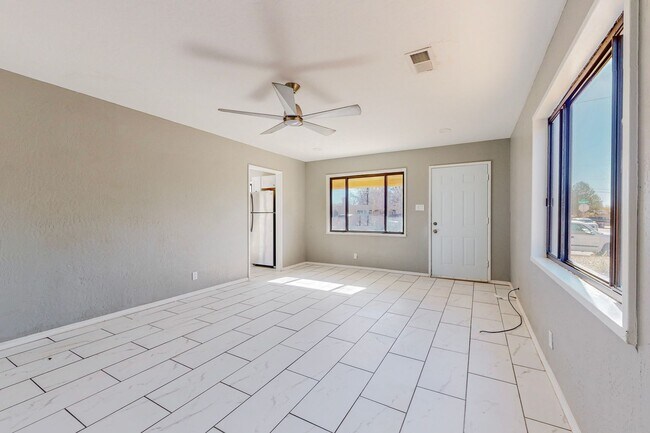 Building Photo - NE PUEBLO STYLE 3 Bedroom 2 Bath 1824/SF