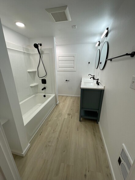 Lower unit bathroom (toilet behind shower) - 1227 7th St