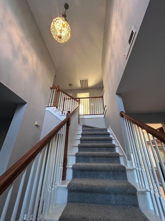 Building Photo - Stunning 4BR Home with amazing pond views!