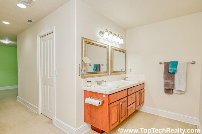Building Photo - Beautiful 4 Bedroom | 2.5 Bathroom | 2,540 Sqft. Home | Central A/C | Solar Panels | Located in B...